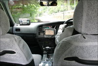 This Taxi in Kyoto, equipped with GPS navigation, is an example of how GPS technology can improve everyday life. 