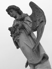 Statue of an angel at a cemetery in Metairie, Louisiana.