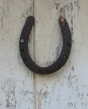 A horseshoe on a door is regarded a protective talisman in some cultures