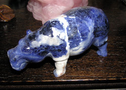 This hippo ornament carved from sodalite demonstrates the mineral's poor cleavage - cracks can be seen throughout the stone.
