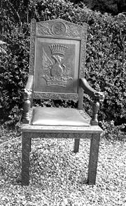 Early twentieth century chair made in eastern Australia, with strong heraldic embellishment