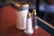 Salt, sugar, and ground black pepper corns are commonly available on Western restaurant tables; however, they are not always considered to be condiments.