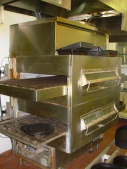 An impingement pizza oven at a Hungry Howie's store in Auburn, Alabama