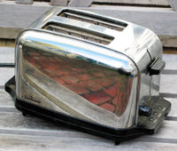 A classically styled chrome two-slot automatic toaster