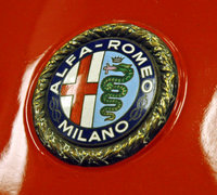 The badge on the front of an Alfa in the Indianapolis Motor Speedway Hall of Fame Museum