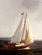  Traditional wooden cutter under sail.