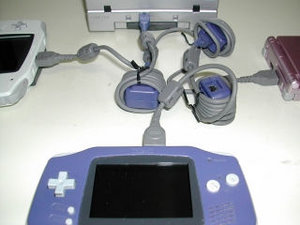 4-Player connection with 2 GBAs, 1 GBA SP, and 1 GameCube with a Game Boy Player attached