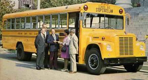 The school bus yellow paint was shining brightly on this new 1973 International Harvester - Wayne Lifeguard school bus won in a national contest for safety ideas. The bus is shown being presented to the  winning driver from Goochland County Public Schools at the Virginia State Capitol