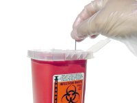 Immediate disposal of used needles into a sharps container is standard procedure.