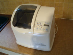 A bread machine, or bread maker