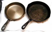 Cast iron skillets, before seasoning (left) and after several years of use (right).