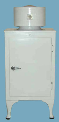 A Monitor-style (General Electric format) refrigerator, more like an icebox with its refrigerating mechanisms on top.