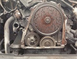 Valve timing gears on a Ford Taunus V4 engine â€” the small gear is on the crankshaft, the larger gear is on the camshaft. The gear ratio causes the camshaft to run at half the RPM of the crankshaft.