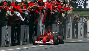 The Scuderia celebrate another Schumacher win, (C) Ferrari Press Office
