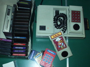 Intellivision II featuring the game Burger Time and the voice synthesis module.
